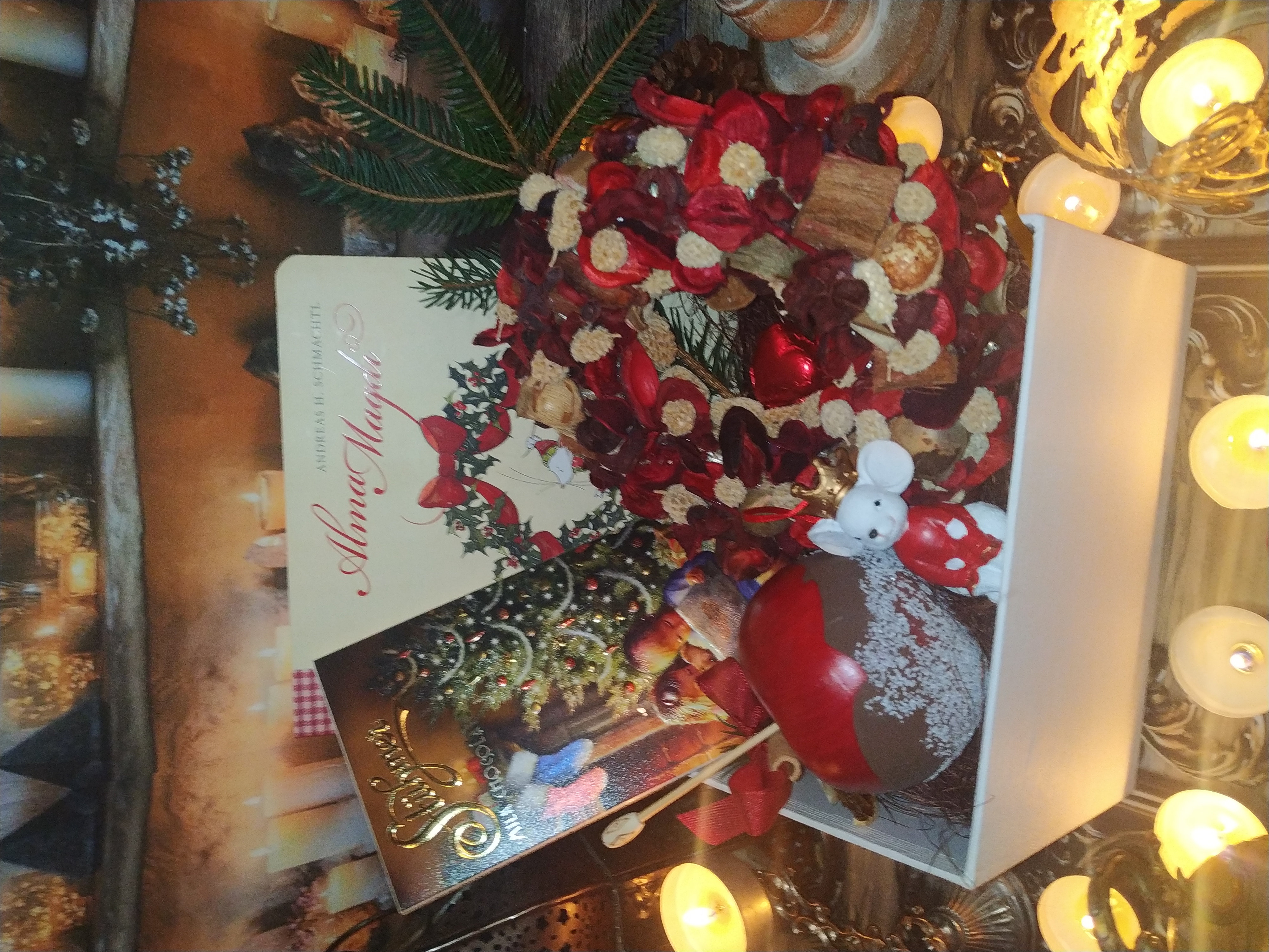 karácsonyi ajándékcsomag csokoládéval mesekönyvvel